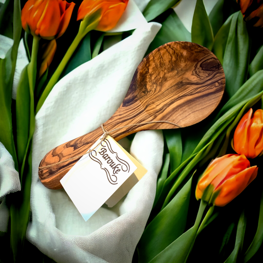 Olive wood spoon rest which doubles as a coffee scoop. Great gift idea.
