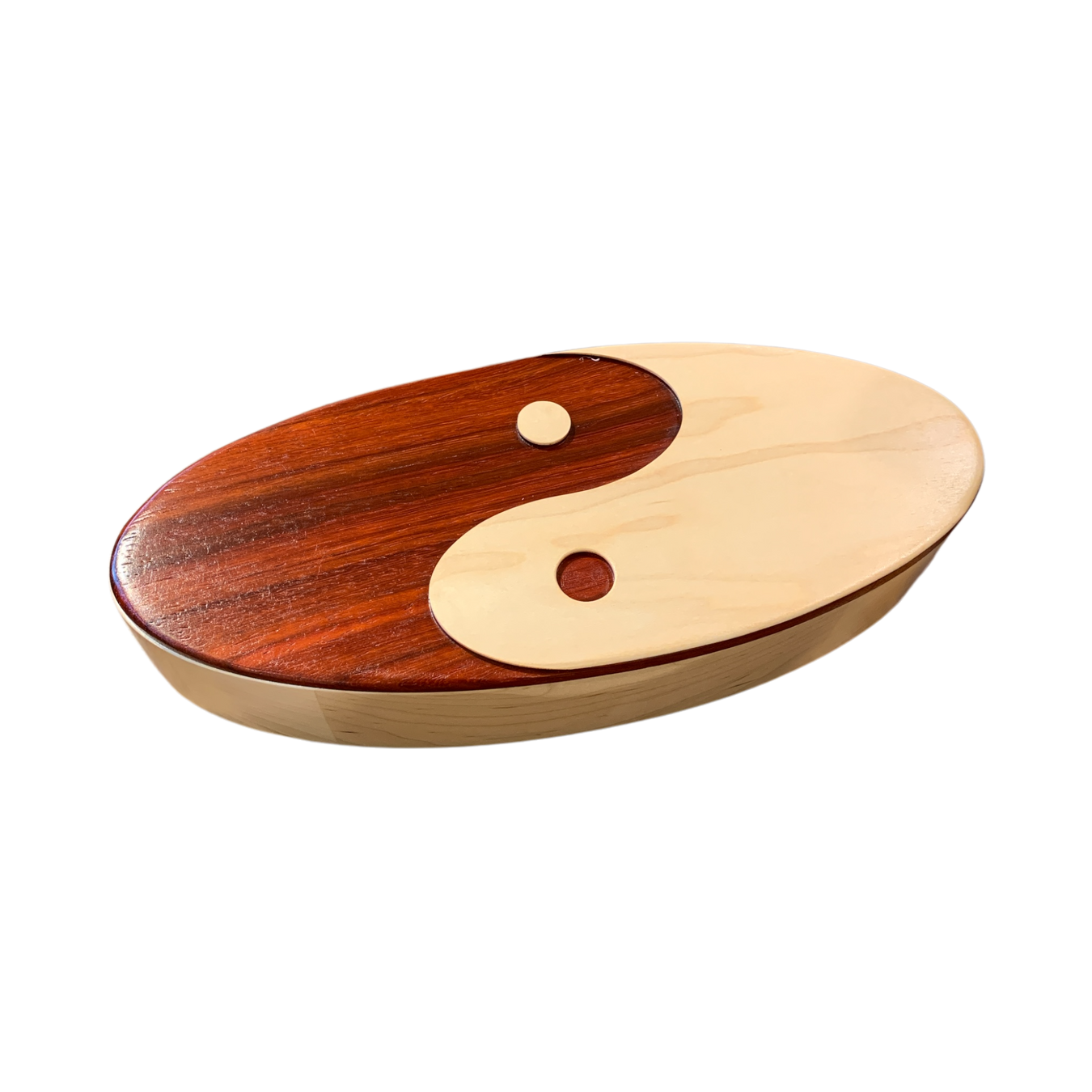 Wooden yin yang keepsake box with smooth polished finish made from african padauk and maple hardwoods.