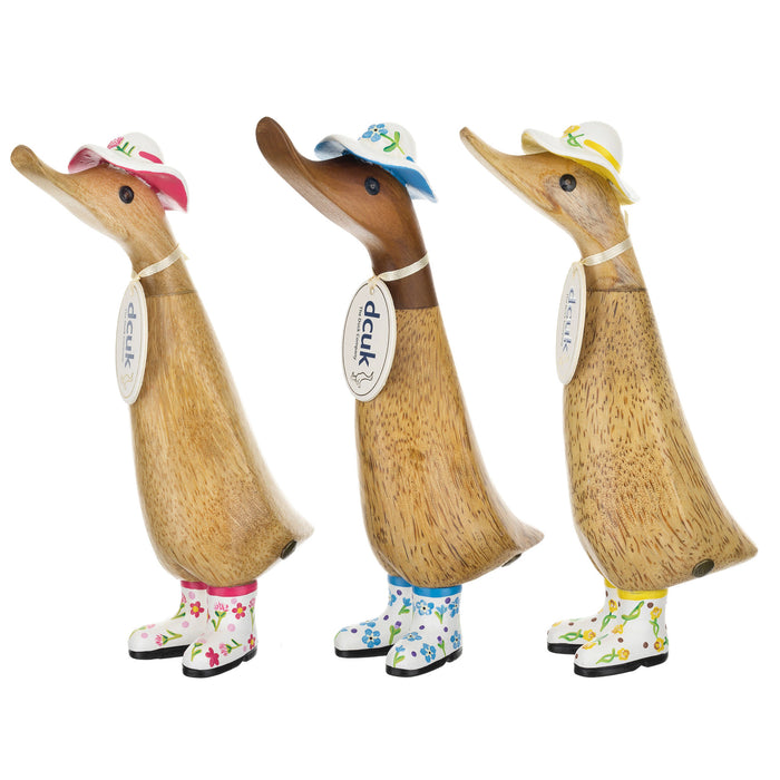 DCUK wooden duckling with forget-me-not flower hat and boots, handmade wooden gift from DCUK Wood Ducks collection.