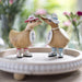 DCUK wooden duck figurine with a forget-me-not flower hat and matching boots, handcrafted wooden gift from DCUK Wood Ducks collection.