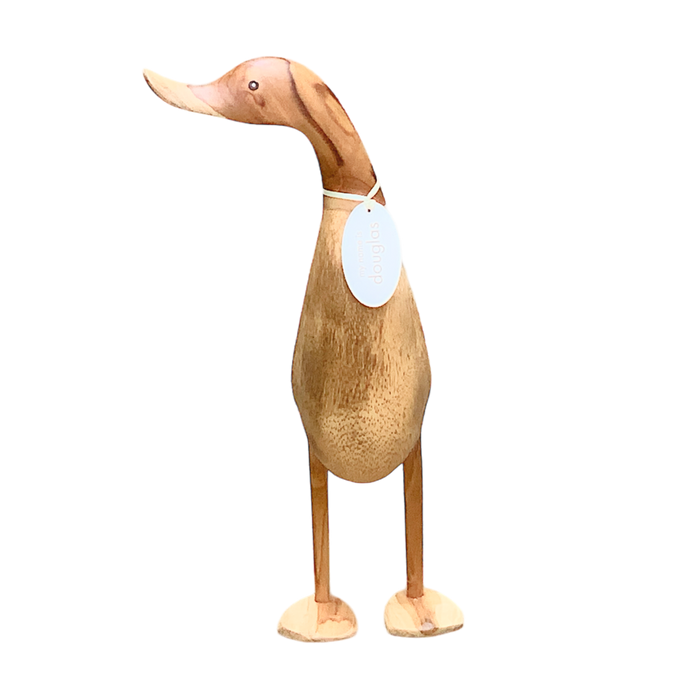 Life-size wooden duck statue crafted from bamboo root, standing elegantly with a whimsical charm and a tag around its neck.