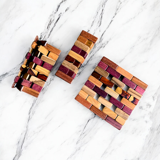 Handmade folding wooden trivets in Cocobolo, Purpleheart, Pau-Amarello. 