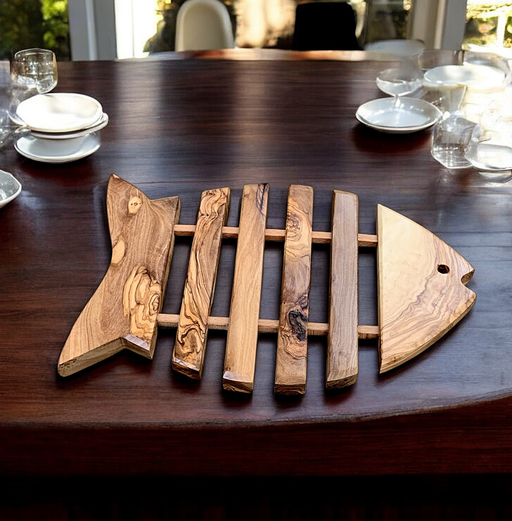 Durable olive wood trivet perfect for kitchen or gift.