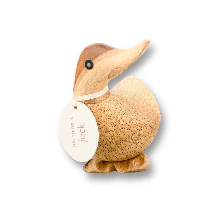 DCUK hand-carved wooden duck collectible displaying a name tag in pose 2