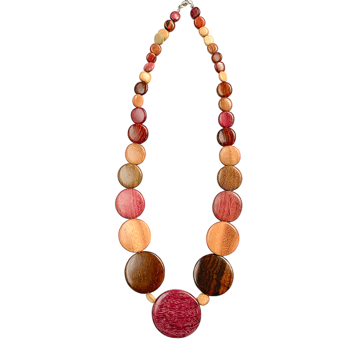 Long Emily Wood Disc Necklace with Central American Woods in graduated sizes from neck to mid chest, showcasing natural wood colors