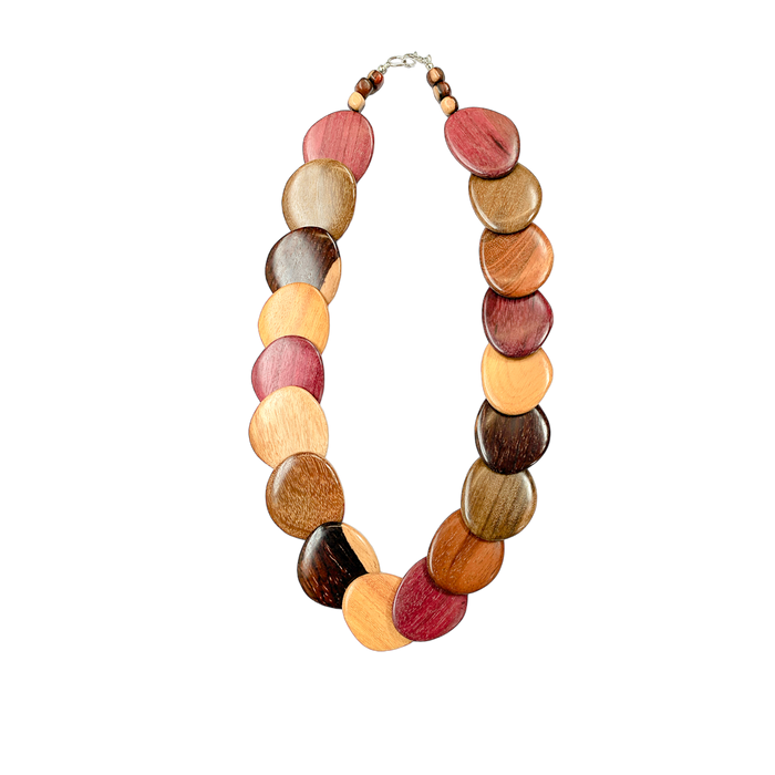 Wood necklace with assorted circular wooden beads in natural colors, creating a unique and stylish accessory.