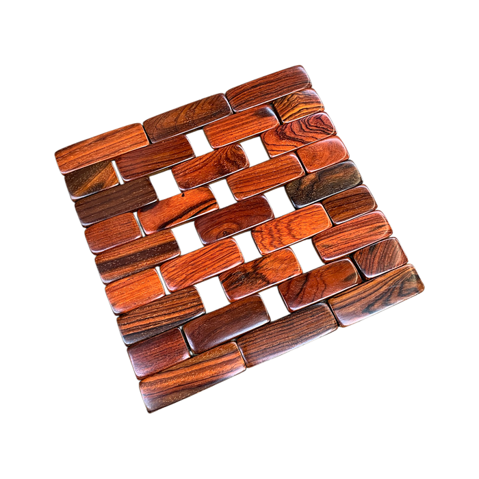 Folding wooden trivet in rich cocobolo hardwood.
