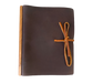 This Large Tie Leather Journal with Ring Binder unites modernity and rusticity with practicality. Meticulously handcrafted from full grain leather that is softened and textured, and augmented with a wooden band along the binding, the journal promotes an opulent writing or note-taking affair. The ring binder's robustness ensures that your notes and works remain securely stored. An exquisite and perpetual piece fit for any connoisseur. 
