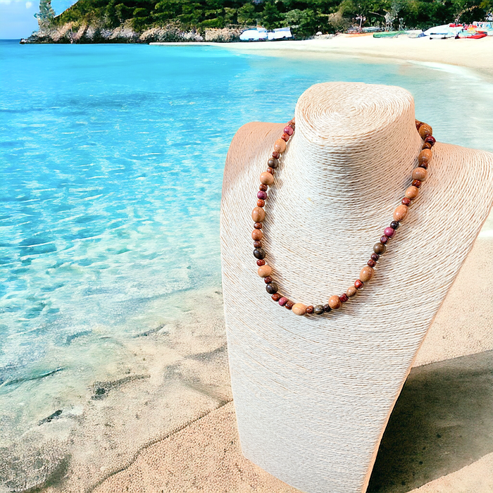 Beaded Holiday Wood Necklace on Display by the Beach