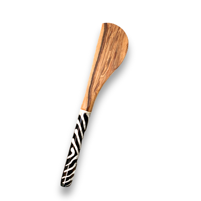 Butter Spreader  made from sustainable olive wood and features a beautiful batik bone handle, crafted by Kenyan artisans for a unique and special look. 