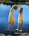 Bamboo root life-size wooden ducks by the lake, whimsical and sustainable decor perfect for homes or gifts.
