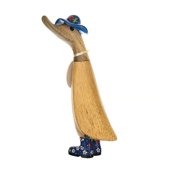 DCUK blue duckling with a delicate floral hat and country-style boots