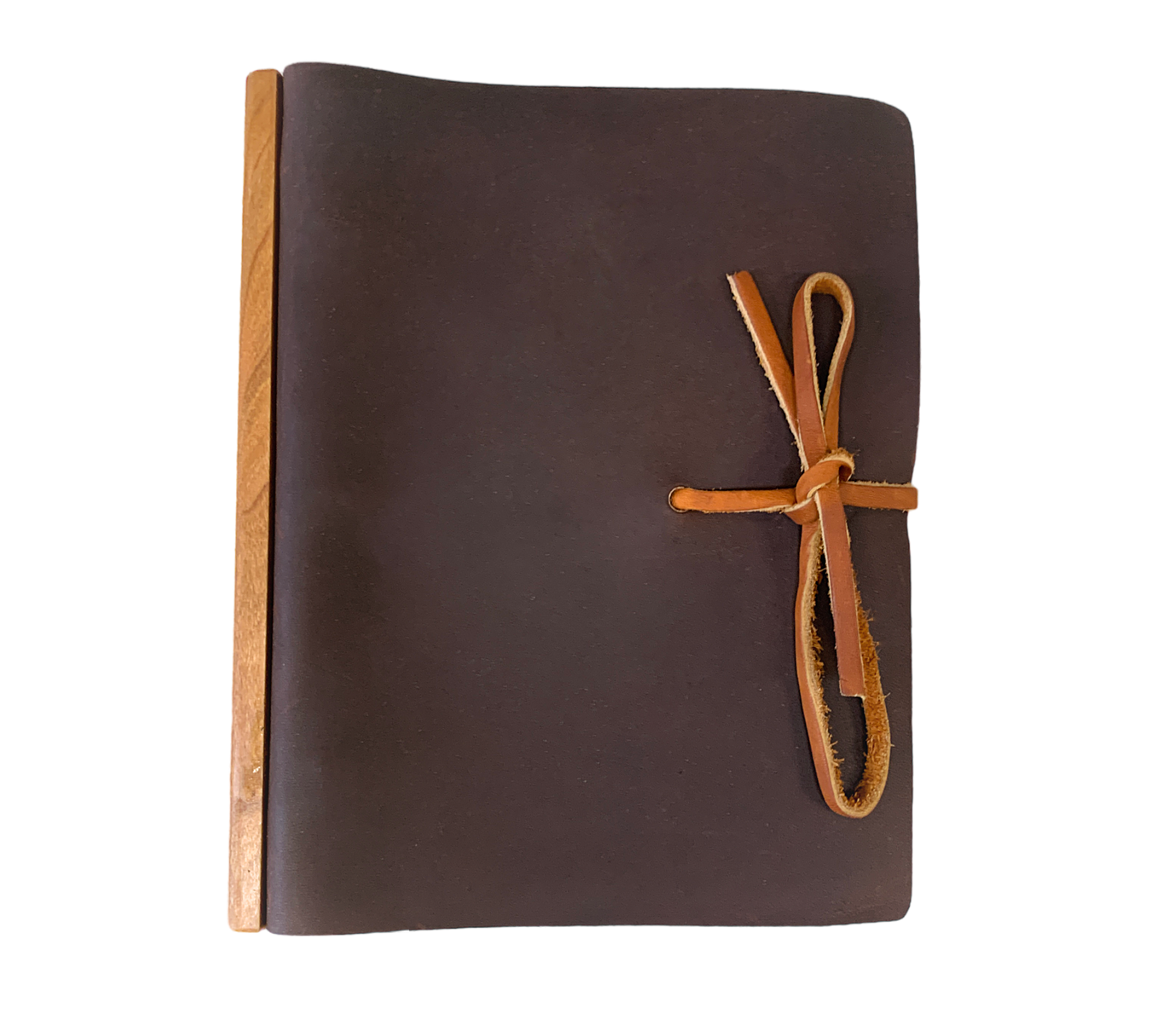 This Large Tie Leather Journal with Ring Binder unites modernity and rusticity with practicality. Meticulously handcrafted from full grain leather that is softened and textured, and augmented with a wooden band along the binding, the journal promotes an opulent writing or note-taking affair. The ring binder's robustness ensures that your notes and works remain securely stored. An exquisite and perpetual piece fit for any connoisseur. 