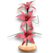 Mauve Lily Wood Flower Arrangement. Handcrafted in the Northern USA, this arrangement features stunning lilies in a rich red oak vase, complemented by delicate grasses and leaves. 