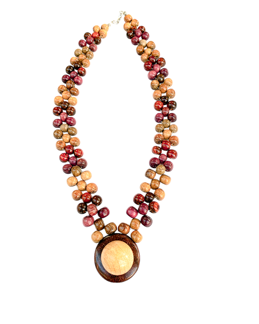 Wood necklace Diane is beaded and made of various exotic woods with a  round hat-shaped pendant