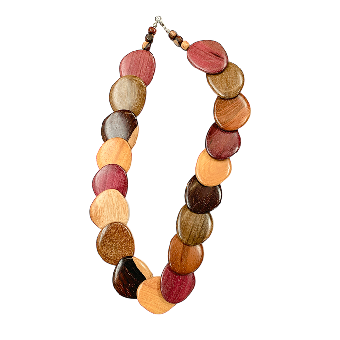 Handmade wood necklace with assorted wooden beads in varying shades.