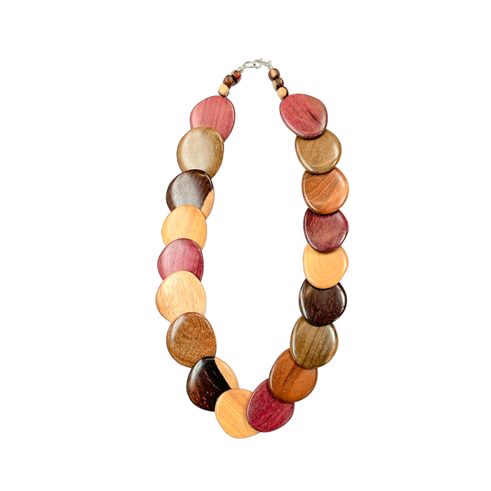 Wood necklace Rachael in assorted woods with circular multicolored wooden beads arranged in a unique and stylish pattern