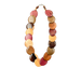 Colorful wood necklace with assorted wood tones in circular shapes forming a stylish and unique accessory