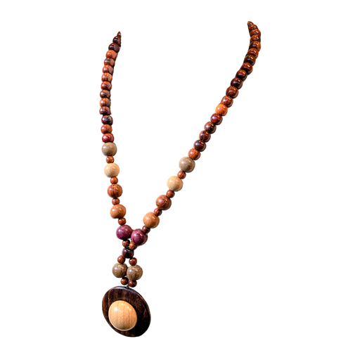 Necklace Elizabeth featuring assorted exotic woods, handmade and 22 inches long, perfect for dressing up a sweater.