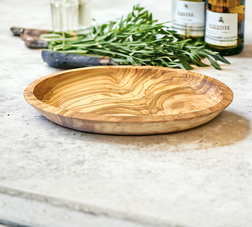 Cute Oval Dipping Dish made from Olive wood. Available at Barouke.