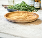 Cute Oval Dipping Dish made from Olive wood. Available at Barouke.