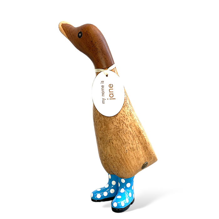 Handcrafted bamboo and teak wood duckling with blue polka dot boots and a name tag reading "My name is Jane"