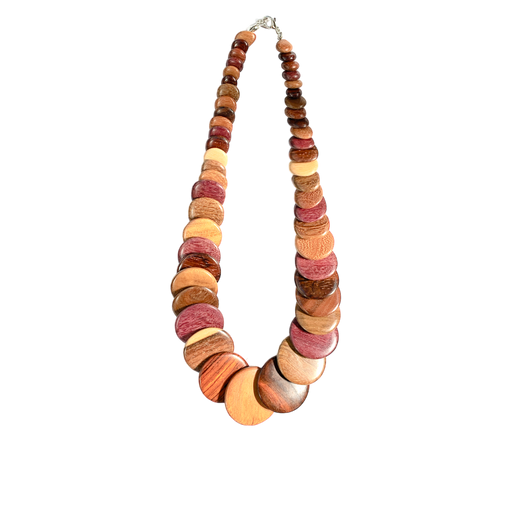 Handmade exotic wood necklace with overlapping discs in Purple Heart, Pau Amarillo, and Cocobolo wood, showcasing elegant craftsmanship.