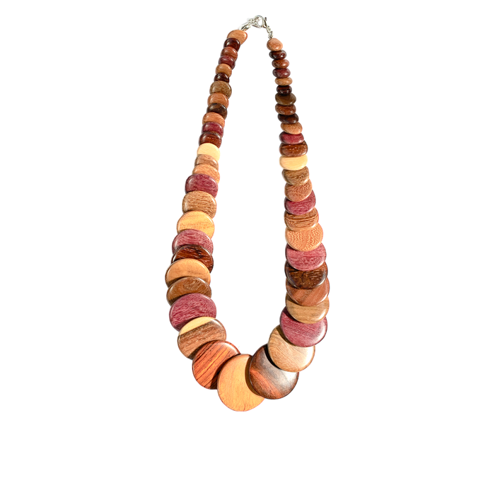 Handmade exotic wood necklace with overlapping discs in Purple Heart, Pau Amarillo, and Cocobolo wood, showcasing elegant craftsmanship.