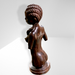 Lignumvitae Art Sculpture - Girl in Braids - Barouke - The WoodCrafters Gallery