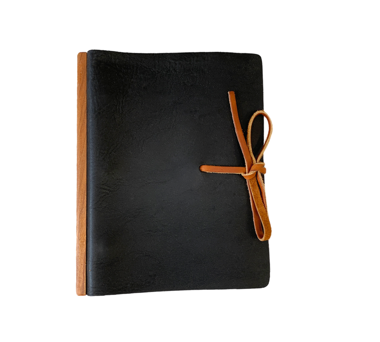 Handcrafted Full Grain Leather Journal. The Ring Binder, Wood Accent, and Leather Tie blend seamlessly, adding both functionality and charm to your writing journey.